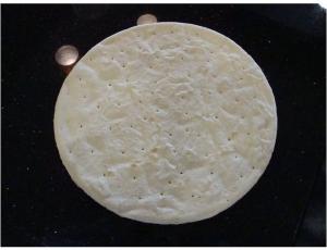 Alive and Kicking Par Baked Pizza Crust - 24 per case.