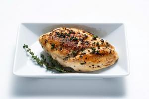 Cuisine Solutions Seared Chicken Breast with Thyme - 28 per case.