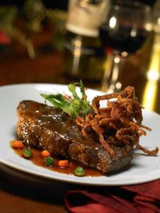 Bonewerks Culinarte Demi Glace Braised Boneless Beef Short Ribs - 20 per case.
