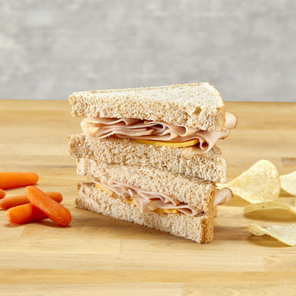 Deli Express Individually Wrapped Mega Hickory Smoked Turkey & Cheese Sandwich Wedge, 8 x 5.8 oz Case - Prepared Foods