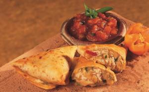 Cuisine Innovations Chicken and Cheese Quesadilla - 100 per case.